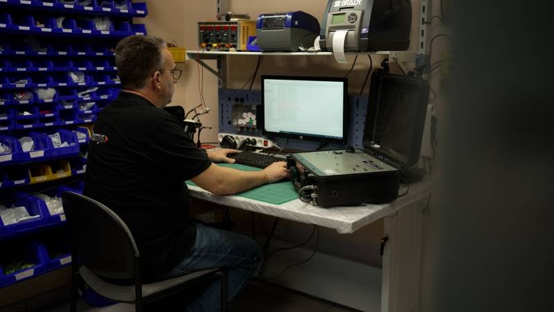 Themys engineers testing an AIS system for the marine environment